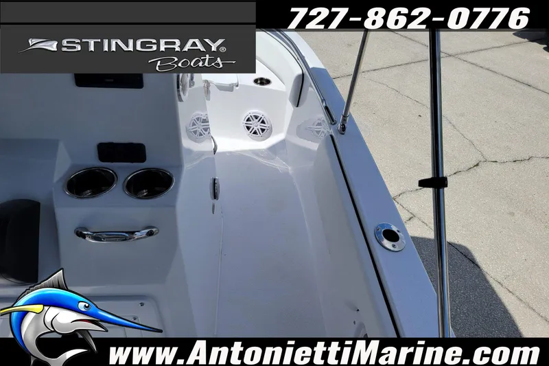Slide: The Image of 2026 Stingray 173CC boat interior with cup holders and speakers, showcased by Antonietti Marine. - 19