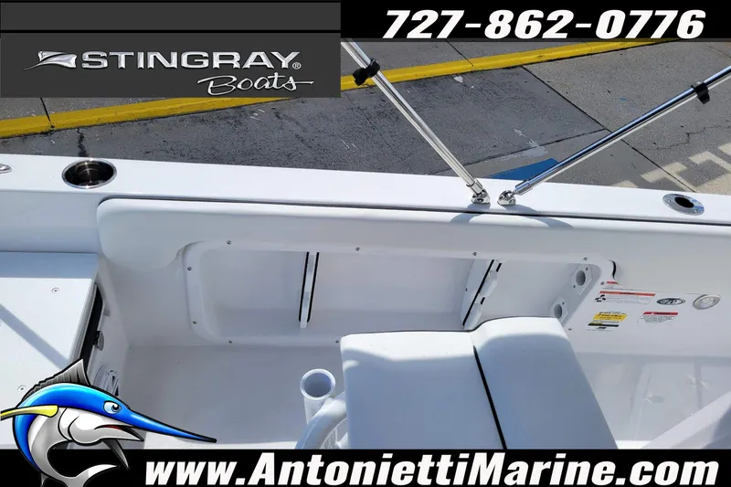 Slide: The Image of 2026 Stingray 173CC boat interior with rod holders and seating, Antonietti Marine branding. - 30