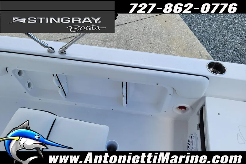Slide: The Image of 2026 Stingray 173CC boat interior with seating and cup holder, displayed by Antonietti Marine. - 32