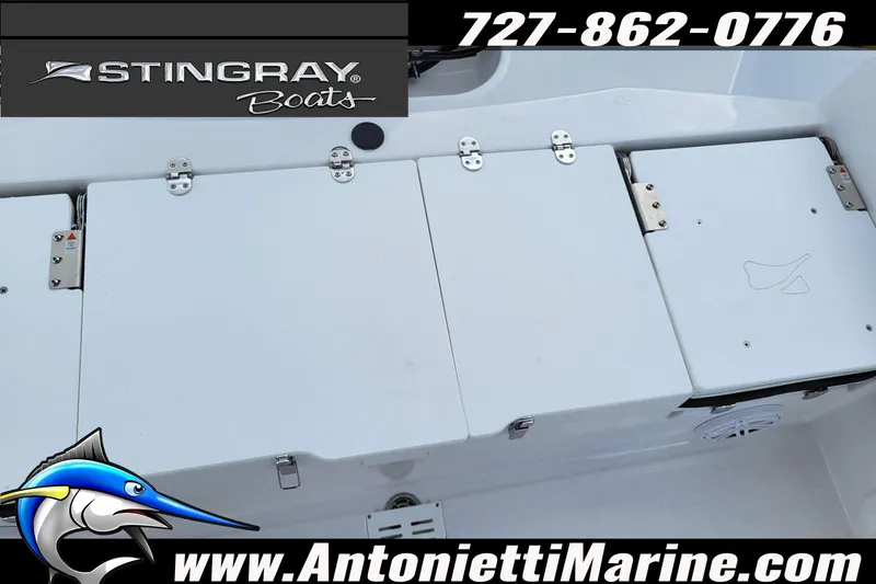 Slide: The Image of 2026 Stingray 173CC boat deck with storage compartments, featuring Stingray Boats branding. - 41