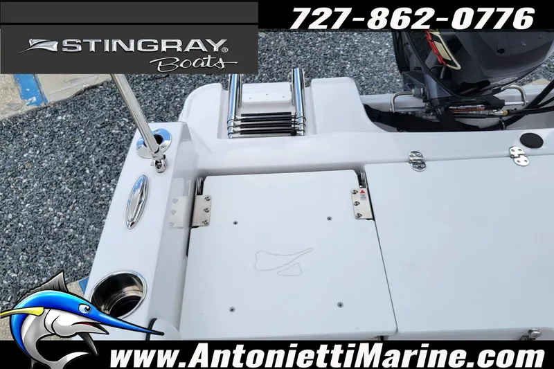 Slide: The Image of 2026 Stingray 173CC boat deck with ladder, motor, and branding details. - 44