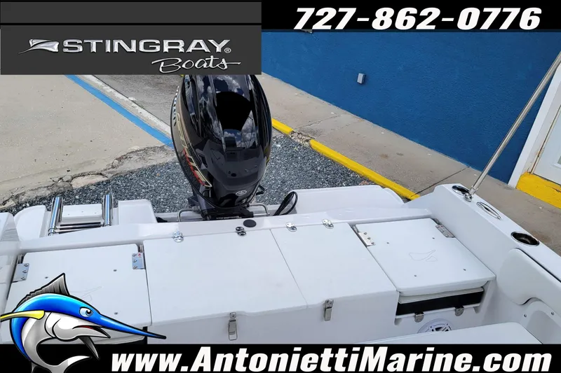 Slide: The Image of 2026 Stingray 173CC boat with outboard motor at Antonietti Marine dealership. - 45