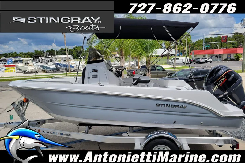 Slide: The Image of 2026 Stingray 173CC boat on trailer at Antonietti Marine dealership. - 51