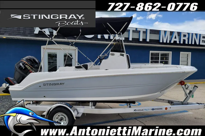 Slide: The Image of 2026 Stingray 173CC boat on trailer at Antonietti Marine dealership. - 57