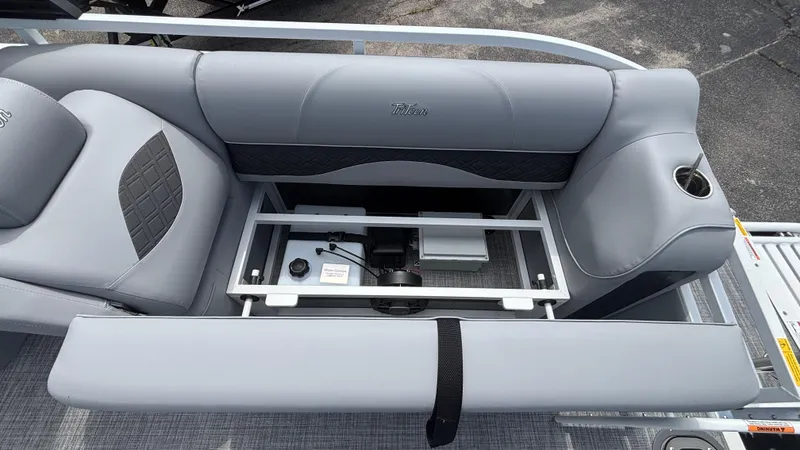 Slide: The Image of 2025 JC Neptoon 25TT Sport boat seat storage compartment with gray upholstery and cup holder. - 17