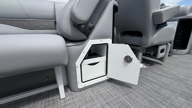 Slide: The Image of Interior storage compartment of 2025 JC Neptoon 25TT Sport boat with open door. - 18