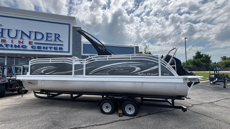 The Image of 2025 JC Neptoon 25TT Sport pontoon boat on trailer at Thunder Marine Center. - 2