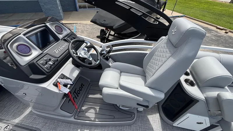 Slide: The Image of 2025 JC Neptoon 25TT Sport boat interior with modern helm and luxurious seating. - 20