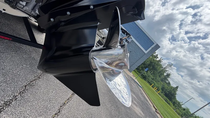 Slide: The Image of Close-up of Suzuki outboard motor propeller on 2025 JC Neptoon 25TT Sport boat. - 5