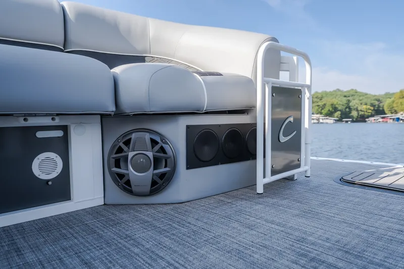 Slide: The Image of 2025 JC Neptoon 25TT Sport pontoon boat interior with premium audio system and sleek seating. - 40