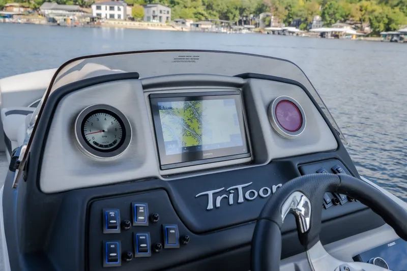Slide: The Image of Dashboard of 2025 JC Neptoon 25TT Sport boat with navigation display. - 12