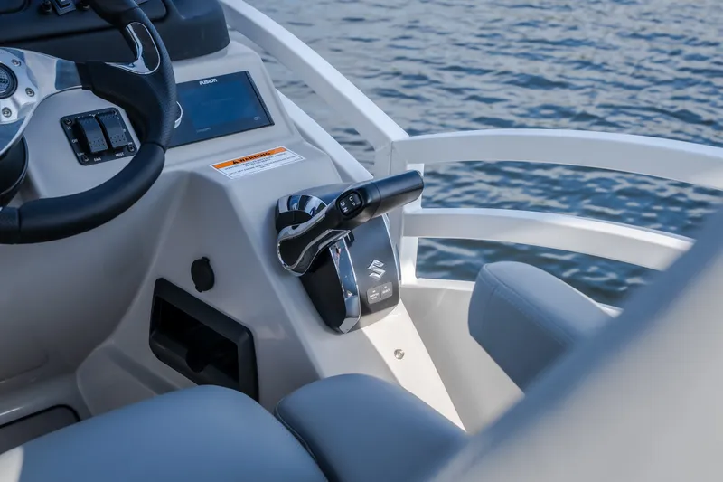 Slide: The Image of Helm of 2025 JC Neptoon 25TT Sport boat with steering wheel and controls. - 9