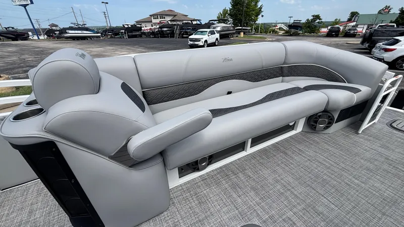 Slide: The Image of 2025 JC Neptoon 25TT Sport pontoon boat with luxurious gray seating and cup holders. - 34