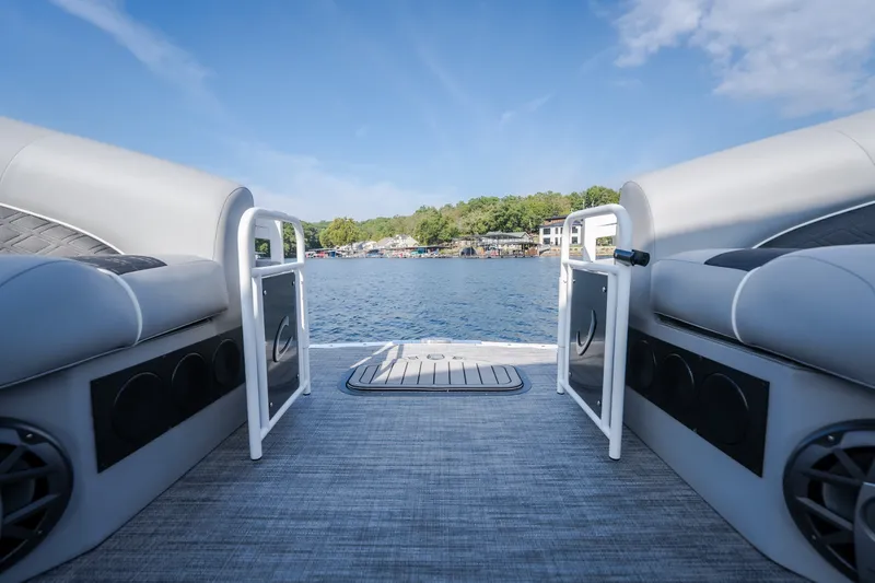 Slide: The Image of 2025 JC Neptoon 25TT Sport pontoon boat interior with lake view and luxurious seating. - 41