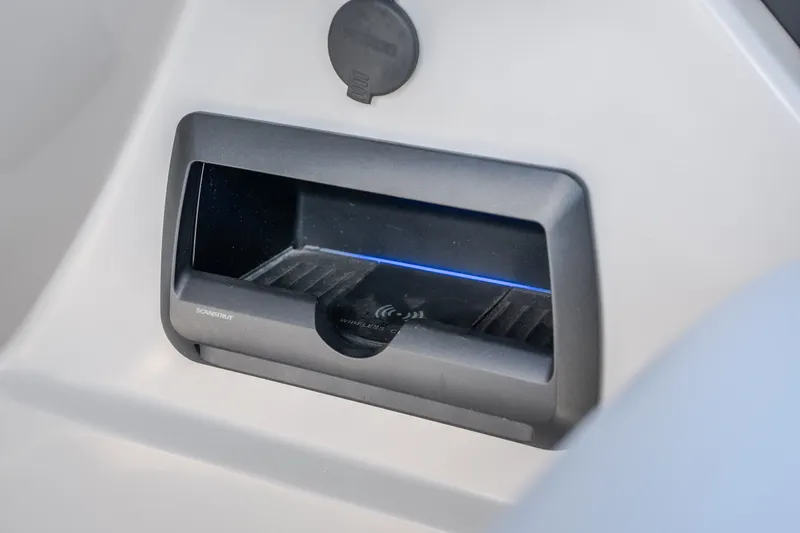 Slide: The Image of Wireless charging station on 2025 JC Neptoon 25TT Sport boat. - 10