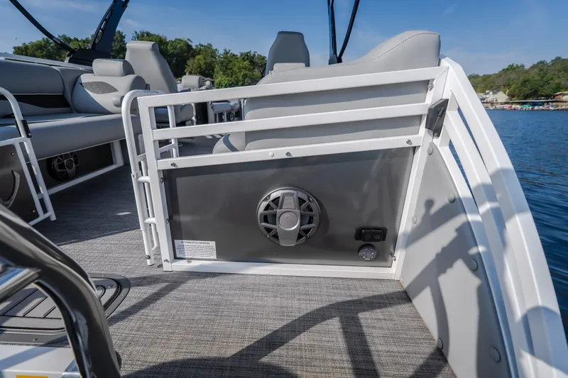 Slide: The Image of 2025 JC Neptoon 25TT Sport pontoon boat interior with speaker and seating. - 29