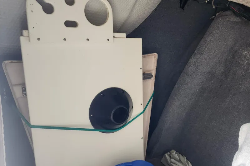 Slide: The Image of Interior of a 2012 Grady-White Freedom 307 boat with storage compartment. - 21