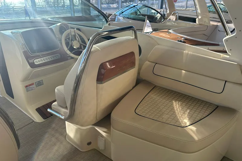 Slide: The Image of 2026 Chris-Craft Launch 31 GT interior with luxurious seating and modern dashboard. - 17