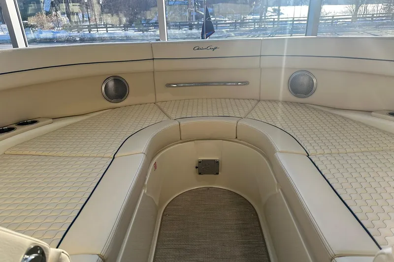 Slide: The Image of Luxurious interior of 2026 Chris-Craft Launch 31 GT boat with elegant seating and speakers. - 20