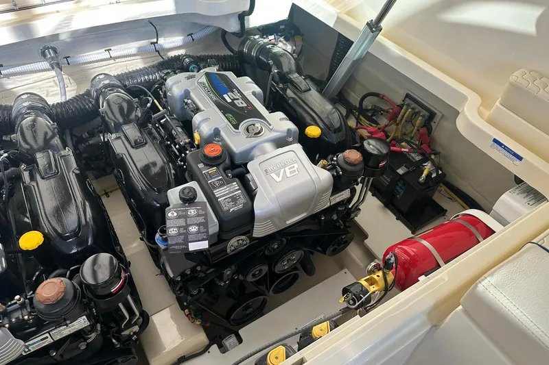 Slide: The Image of Engine compartment of 2026 Chris-Craft Launch 31 GT with V8 engine and fire extinguisher. - 29