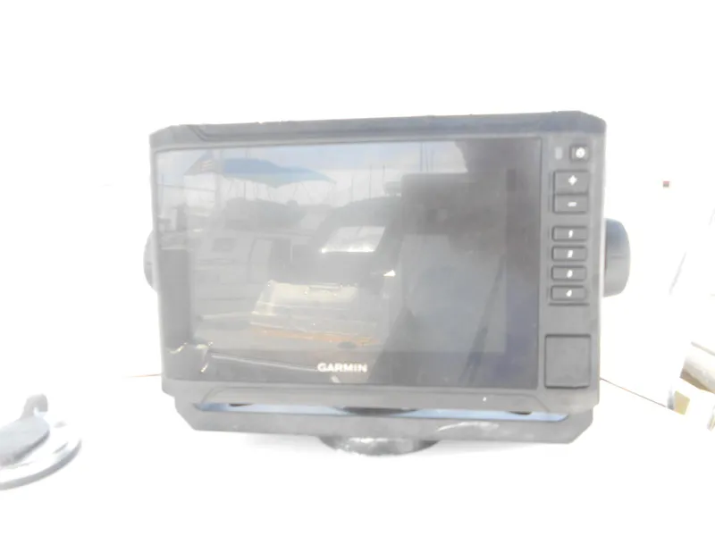 Slide: The Image of Garmin marine GPS on 2003 Boston Whaler 190 Nantucket boat dashboard. - 7