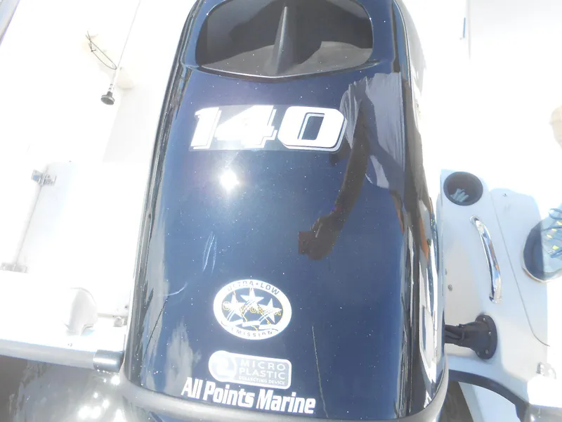 Slide: The Image of Outboard motor on 2003 Boston Whaler 190 Nantucket, featuring "140" and "All Points Marine" branding. - 8