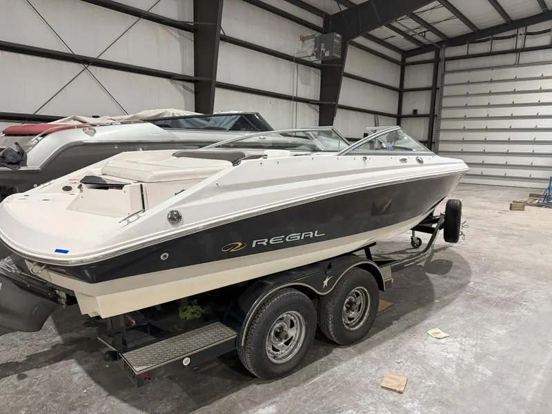 Slide: The Image of 2008 Regal 2000 Bowrider boat on trailer in indoor storage facility. - 3