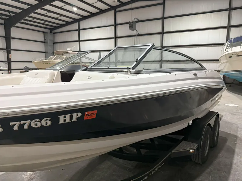 Slide: The Image of 2008 Regal 2000 Bowrider boat in indoor storage, side view. - 5
