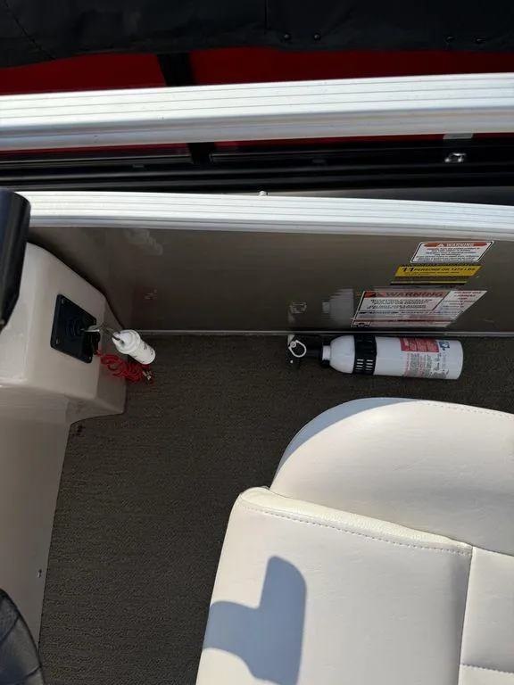 Slide: The Image of Interior of a 2015 Bennington 21 SLX boat with safety equipment. - 20