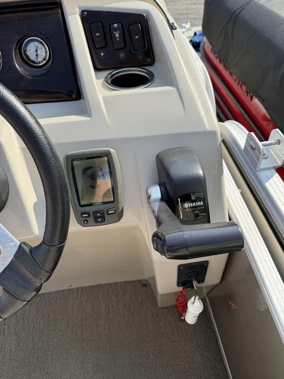 Slide: The Image of Control panel of a 2015 Bennington 21 SLX boat with Yamaha throttle. - 22