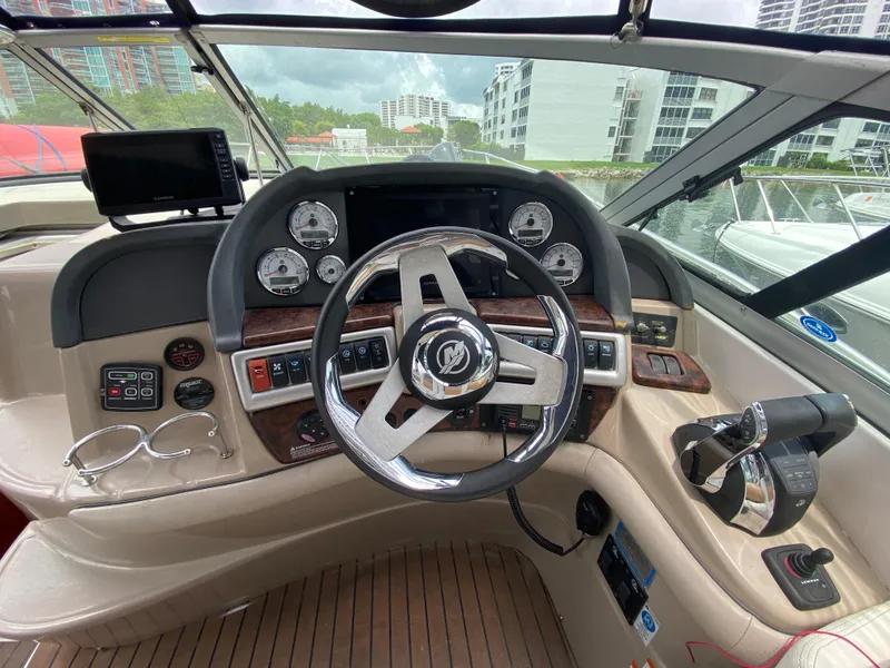 Slide: The Image of Helm of 2006 Four Winns 348 Vista boat with modern controls and gauges. - 20