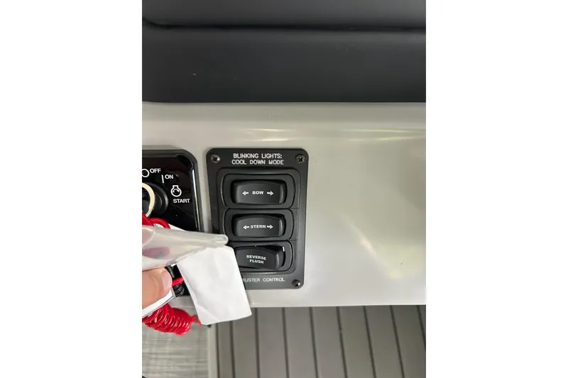 Slide: The Image of Control panel of 2025 JC NEPTOON 27TT SPORT boat with start and thruster buttons. - 12