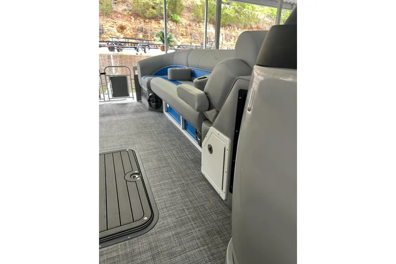 Slide: The Image of Interior of 2025 JC NEPTOON 27TT SPORT boat with gray seating and flooring. - 15