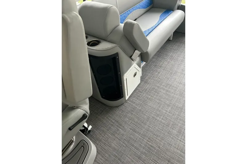 Slide: The Image of Interior of 2025 JC NEPTOON 27TT SPORT boat with gray seating and blue accents. - 20