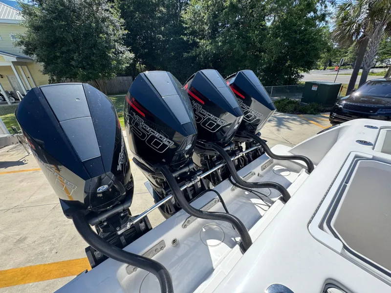 Slide: The Image of Four powerful outboard engines on a 2020 Invincible 39 Open Fisherman boat. - 47
