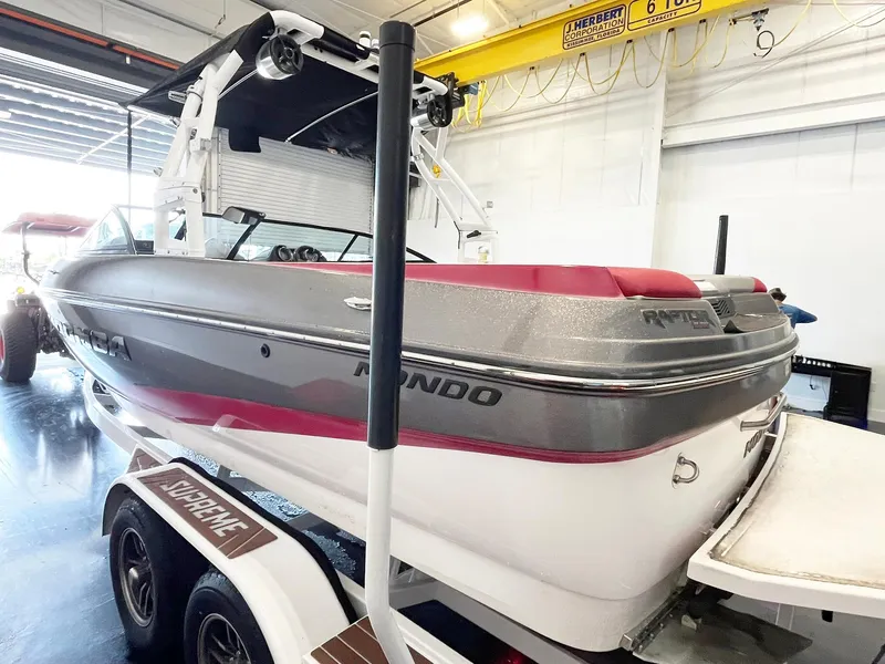 Slide: The Image of 2016 Moomba Mondo boat on trailer in indoor storage facility. - 4