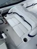 Slide: The Image of 2012 Formula 350 Sun Sport boat interior with white seating and cup holders. - 23