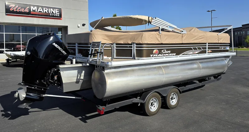 Slide: The Image of 2023 Sun Tracker SportFish 22 XP3 pontoon boat on trailer at Utah Marine Store. - 27