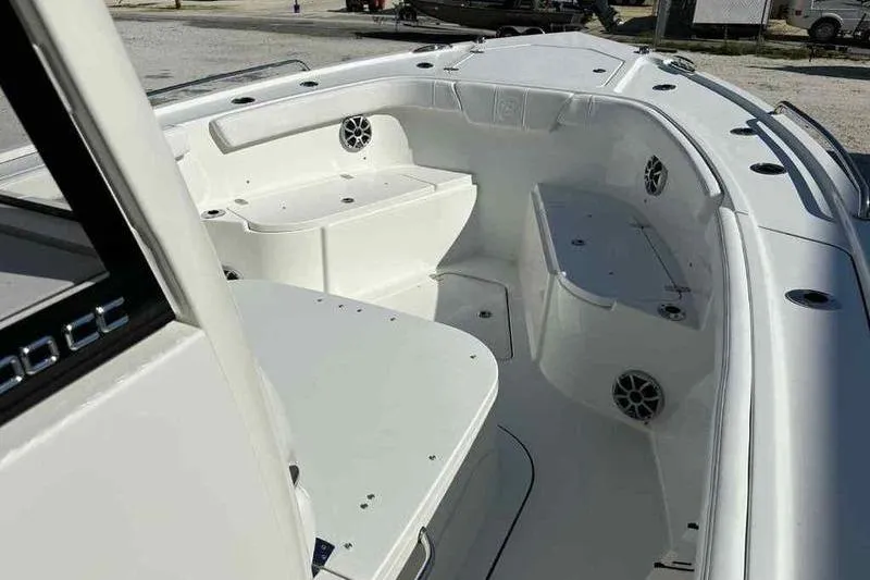 Slide: The Image of 2026 Parker 2900 CC boat interior with seating and storage compartments. - 14