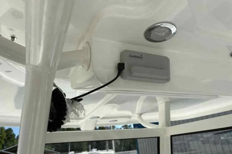 Slide: The Image of 2026 Parker 2900 CC boat with Garmin device installed on the ceiling. - 15
