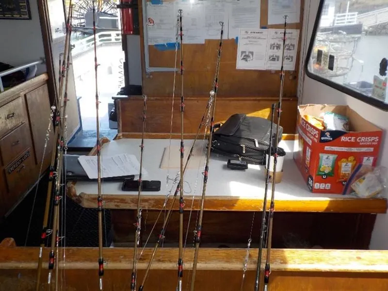 Slide: The Image of Fishing rods and gear inside a 1974 custom passenger vessel cabin. - 10