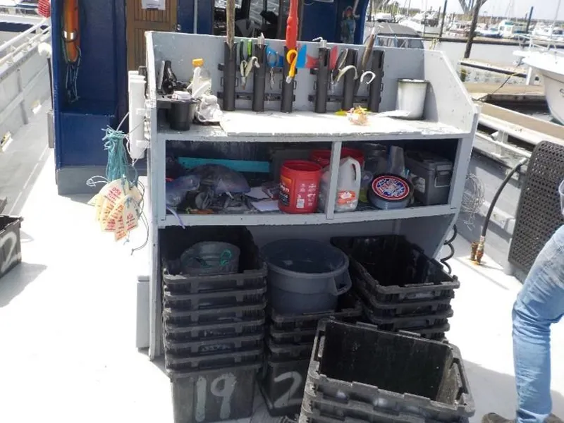 Slide: The Image of Fishing gear and tools organized on a 1974 custom passenger vessel deck. - 6