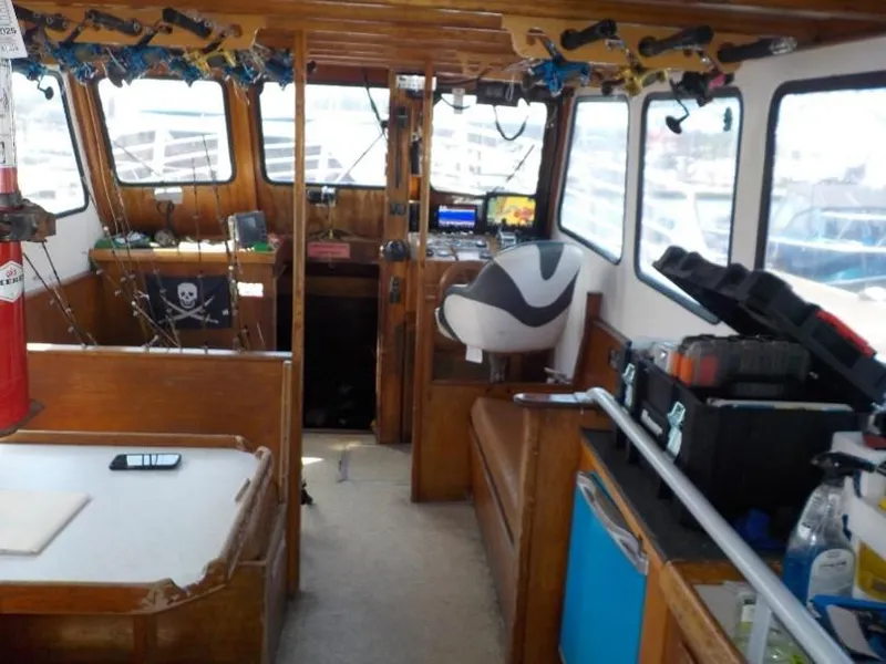 Slide: The Image of Interior of a 1974 custom passenger vessel with fishing gear and navigation equipment. - 7