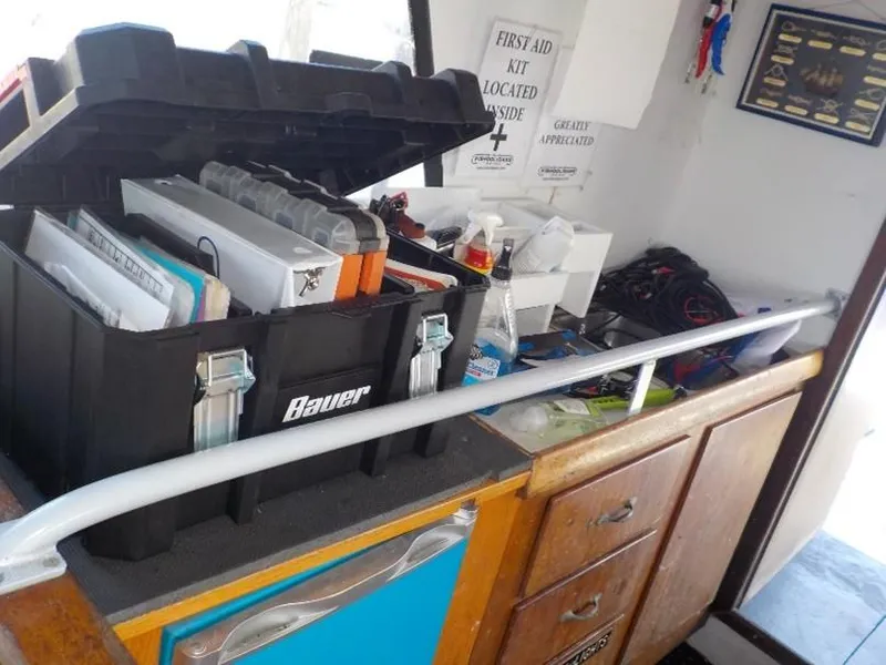 Slide: The Image of Open toolbox on a passenger vessel with various tools and supplies, 1974 model. - 9