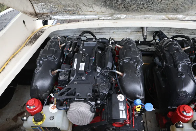 Slide: The Image of 2020 Chris-Craft 30 Launch engine compartment with dual engines and components visible. - 23