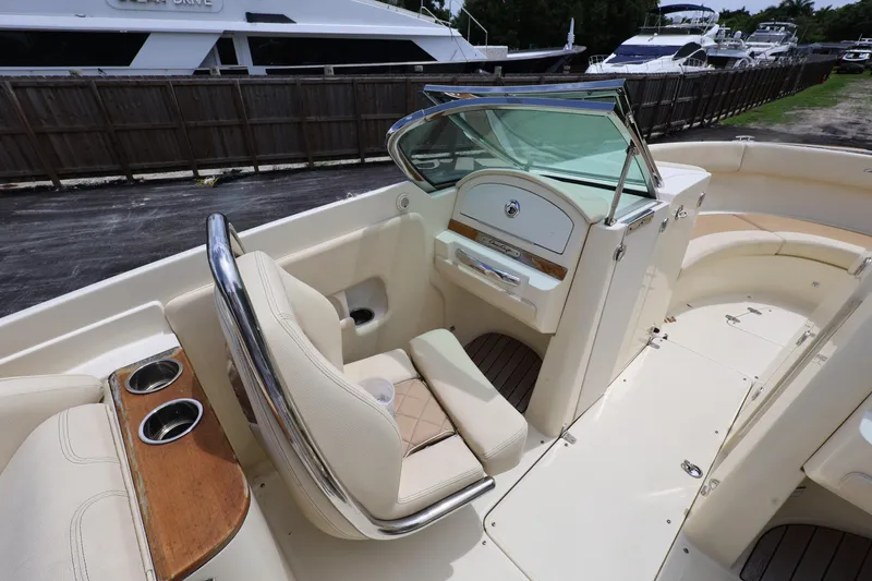 Slide: The Image of 2020 Chris-Craft 30 Launch boat interior with luxurious seating and elegant design. - 7