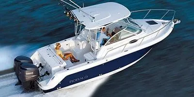Slide: The Image of 2014 Robalo 265R boat cruising on water with passengers onboard. - 5