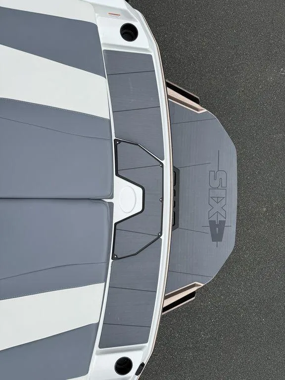 Slide: The Image of Top view of 2026 Axis A225 boat with sleek gray and white design. - 12