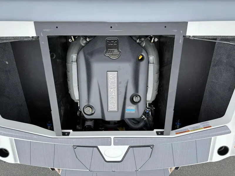 Slide: The Image of 2026 Axis A225 boat engine compartment with Monsoon engine visible. - 13