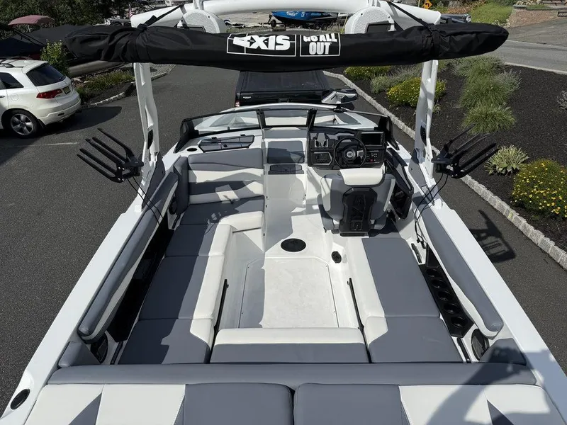Slide: The Image of 2026 Axis A225 boat interior with sleek seating and modern dashboard. - 5